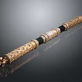 Decorative Gold Carved Metal Hardware Tool With Black Accent And Ornate Design Details
