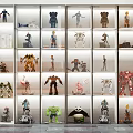 Modern Display Cabinet With Transparent Glass Doors Built In Lighting And Various Figurines