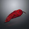 Dried Red Chili Pepper Fruit On Gray Background With Wrinkled Texture And Long Shape