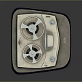 Vintage Computer Tape Drive With Dual White Reels And Textured Casing