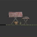 Outdoor Grass Setting With Red White Checkered Table Bench And Fruit Baskets