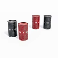 Four Black And Red Oil Drums With Oil Labels On White Surface