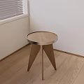 Modern Three Legged Side Table With Wooden Top And Metal Frame In Room Corner