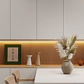 Minimalist Dining Living Room Interior With Wooden Backdrop Framed Art Decorative Vases Dried Flowers And Warm Lighting