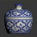 Blue and White Carved Jar with Ornate Lid and Intricate Patterns
