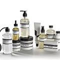 Modern Bathroom Accessories with Clear Bottles Pump Dispensers Jars Tubes Minimalist Design Black White Labels