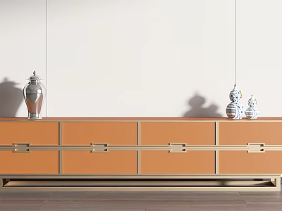 Orange TV Cabinet with Drawers Metal Handles and Decorative Vases on Wooden Floor 3d model