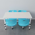 Rectangular White Dining Table With Four Blue Plastic Chairs And Metal Legs 3d model