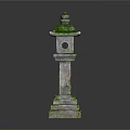 Traditional Stone Lantern With Moss Covered Top And Carved Base Structure