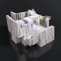 Detailed White Stone Building Featuring Layered Structure Steps And Green Plants