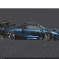 McLaren Blue Sports Car With Aerodynamic Rear Wing And Sporty Exterior Design