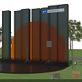 Outdoor Stage Setup With Orange Circular Structure Glass Curtain Wall And Lighting Equipment At Sunset