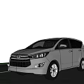 Black Toyota MPV Exterior Design On Scenic Road With Clear Sky