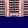 Modern Apartment Building Entrance Gate With Red Frame And Paved Square Area