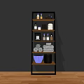 Modern Bathroom Accessories On Multi Tiered Shelf With Towels Bottles And Basket