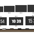 Various Sizes TV Screens Display Different Inches With Digital Numbers On Wooden Shelf