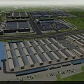 Modern Industrial Factory Buildings With Spacious Parking Lots Vehicles And Green Trees Around