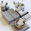Stylish Bathroom Accessories Set With Folded Towels Soap Bars And Flower Vase