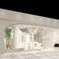 Modern Clothing Store Interior With White Curved Design Mannequins And Green Plants