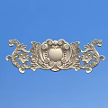 Intricate Ornate Carving with Floral Vines Scrolls and Central Circular Motif on Blue Background