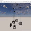 Multiple Modern Design Pendant Lights With Glass And Metal Suspended On Dark Background