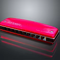 Red Hohner Harmonica With Smooth Metallic Surface And Multiple Reflective Holes
