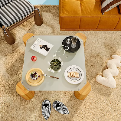 Decorative Ornaments Display On Coffee Table With Book Plant Pastry And Plush Toy 3d model