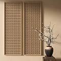 Brown Geometric Carved Screen with White Flower Vase on Light Wall