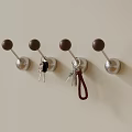 Four Wall Mounted Metal Hooks With Wooden Knobs Hanging Keys In Home 3d model