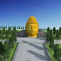 Giant Golden Buddha Head Statue Surrounded by Green Trees Stone Steps and Blue Sky Background