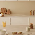 Cozy Kitchen Counter Featuring Bread Wooden Cutting Boards Beans Jars Orange Juice And Milk