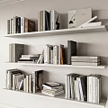 White Bookshelf On Decorative Wall With Multiple Shelves Of Neatly Arranged Books And Magazines