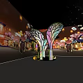 Colorful Leaf Shaped Glowing Light Installation With Yellow Stones And Grass