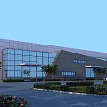 Modern Industrial Factory Building With Glass Facade Steel Structure And Landscaped Surroundings