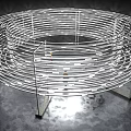 Striking Modern Art Installation With Illuminated Concentric Circular Rings And Visitors