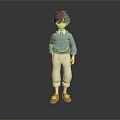 Man in Blue Sweater and Beige Pants Standing on Reflective Floor with Gray Background