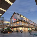 Modern Commercial Street With Glass Facades Pedestrian Walkways And Outdoor Seating Areas