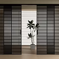 Modern Black Sliding Doors With Vertical Stripes And Indoor Green Plant View