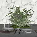 Elegant Tableware Set with Marble Tabletop Greenery Arrangement Wine Glasses Ceramic Plates and Metal Cutlery