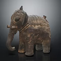 Antique Elephant Sculpture with Carved Textured Surface and Saddle Like Decorative Details