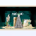MOCO Window Display Featuring Elegant Dress With Decorative Plants And Green Backdrop