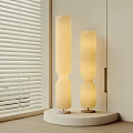 Modern Floor Lamps With Twisted Striped Beige Shades And Metal Bases Near Window Blinds