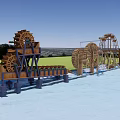Decorative Garden Ornaments With Arranged Wooden Water Wheels And Lush Green Plants