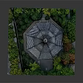 Traditional Chinese Multi tiered Pagoda with Curved Eaves Red Accents Surrounded by Green Plants