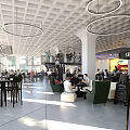 Modern Cafe Front Desk Reception With Open Space And Hanging Lights