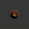 Red Tropical Fruit With Peeled Spiky Skin And Smooth Flesh On Dark Background