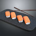 Delicious Fresh Salmon Sushi Rolls Placed On Black Stone Plate With Chopsticks