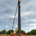 Heavy Duty Orange Black Hydraulic Pile Driver With Support Base Track System For Construction Site