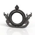 Intricate Black Sculpture Carving with Circular Frame Mythical Beast Motifs and Ornate Patterns