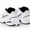 Nike White Retro Athletic Sneakers Featuring Silver Swoosh And Black Sole